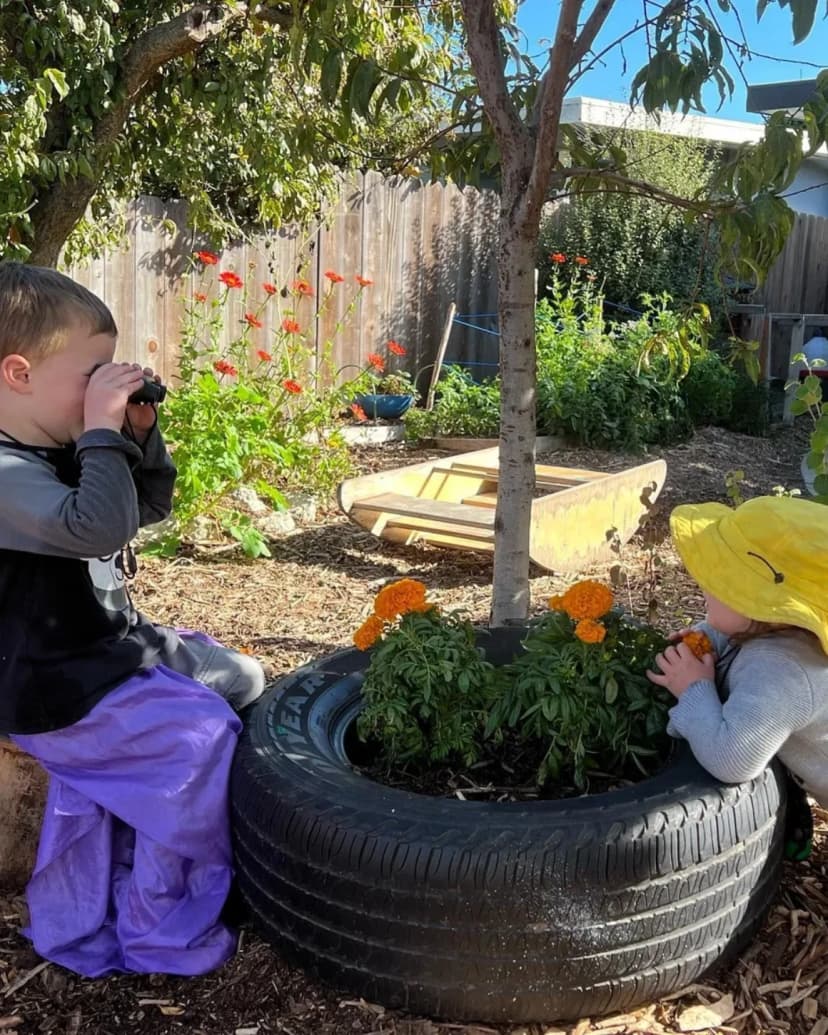 Children exploring with binoculars